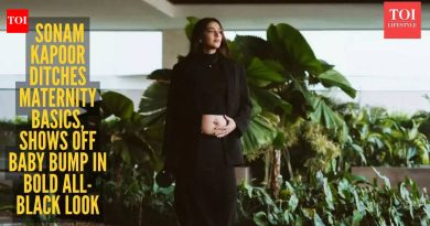 सोनम कपूर स्लीक ब्लॅक लूकमध्ये बेबी बंप दाखवते |